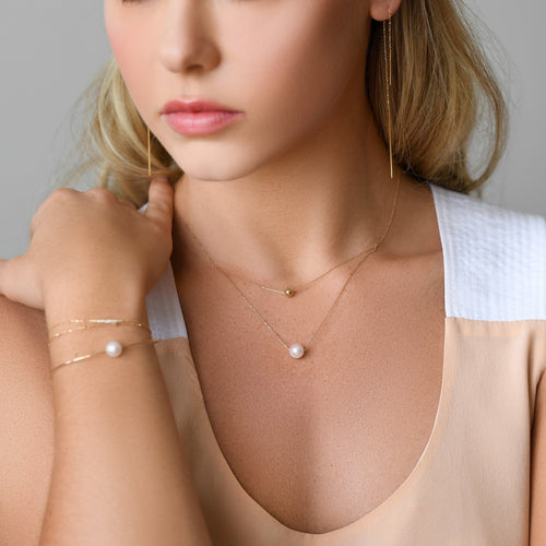 One Akoya White Pearl and One Gold Ball Necklace